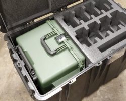 LARGE CUSTOM PELICAN CASE INSIDE A LARGER ONE